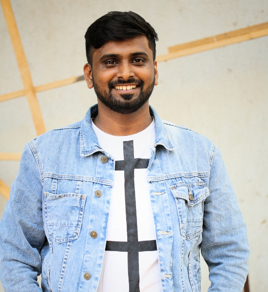 Selvam portrait in denim jacket
